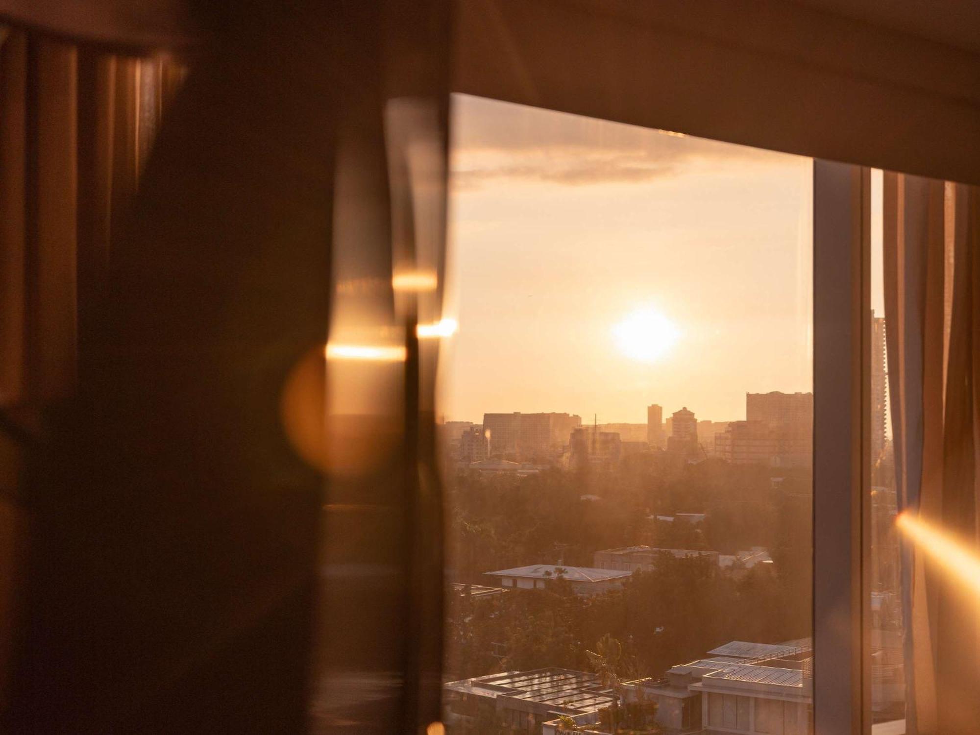 Fairmont Makati Hotel Makati City Exterior photo Sunset view from the 10th floor